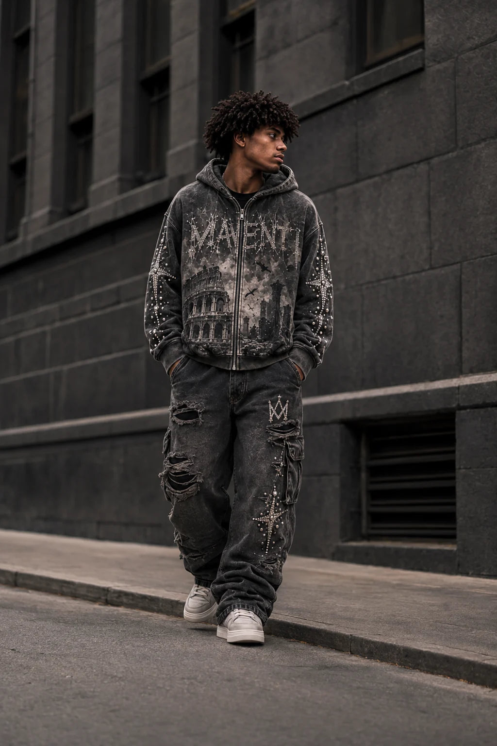 Campaign concept of a model walking beside a stone city building in the dark Ruins - Colosseum hoodie and cargo sweatpants.